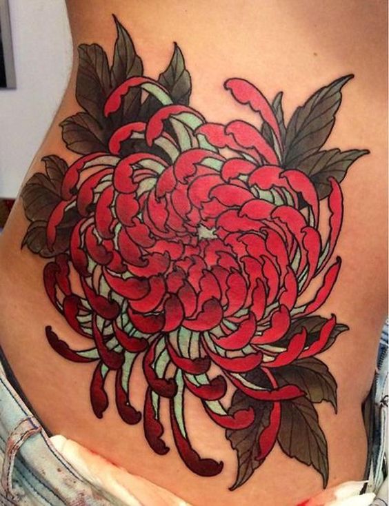 Red chrysanthemum tattoo on the side