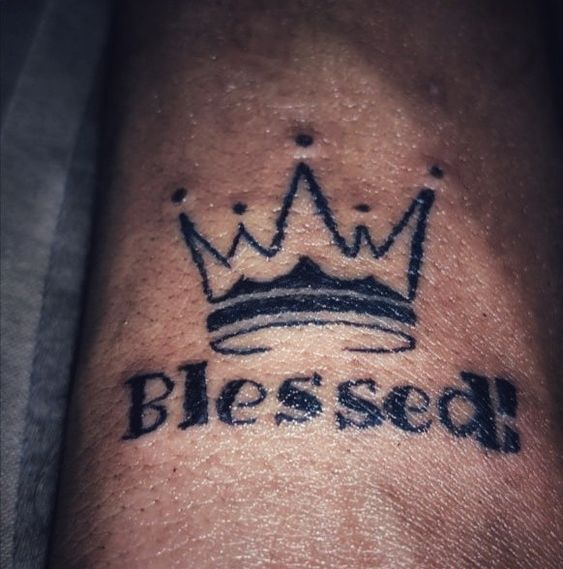 Blessed lettering tattoo with crown is popular choice these days