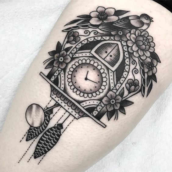 Calf Cuckoo clocks tattoo 1