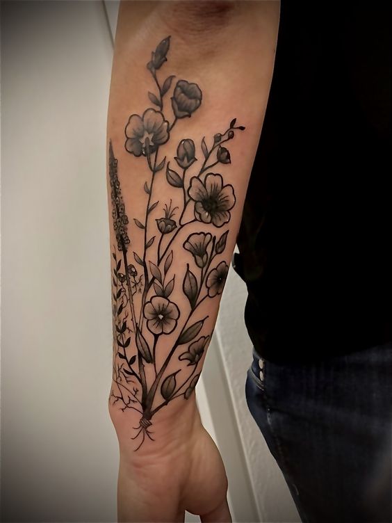 Discover flower tattoos with wildflower forearm tattoos in 20 images