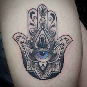 Hamsa is a palm shaped amulet and actually authentic tattoo idea 5