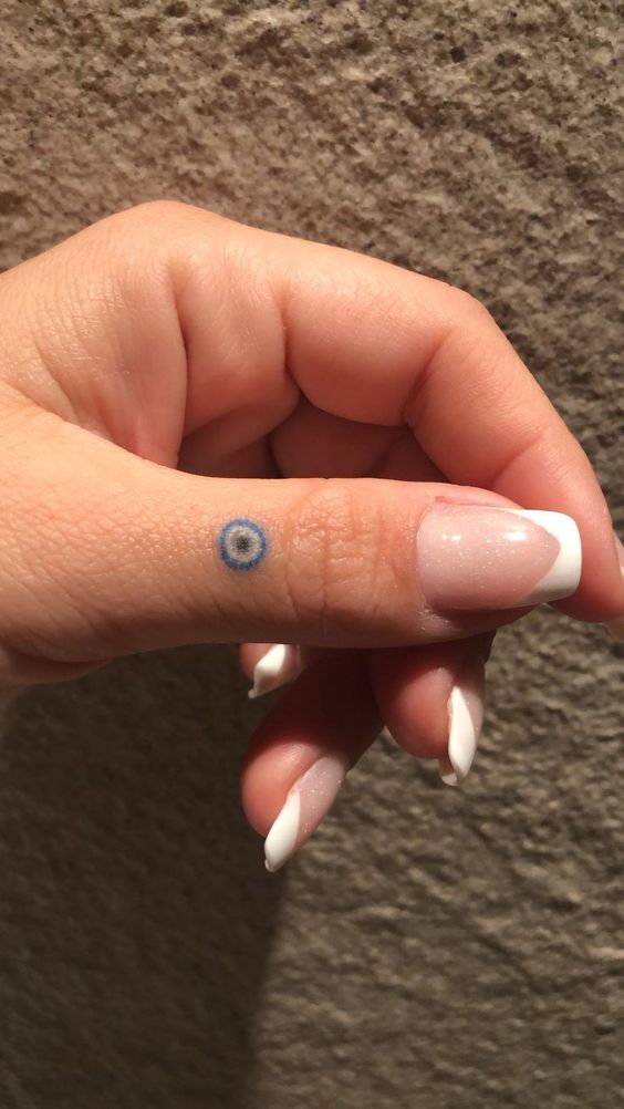 Ideas and meaning of evil eye tattoos 5