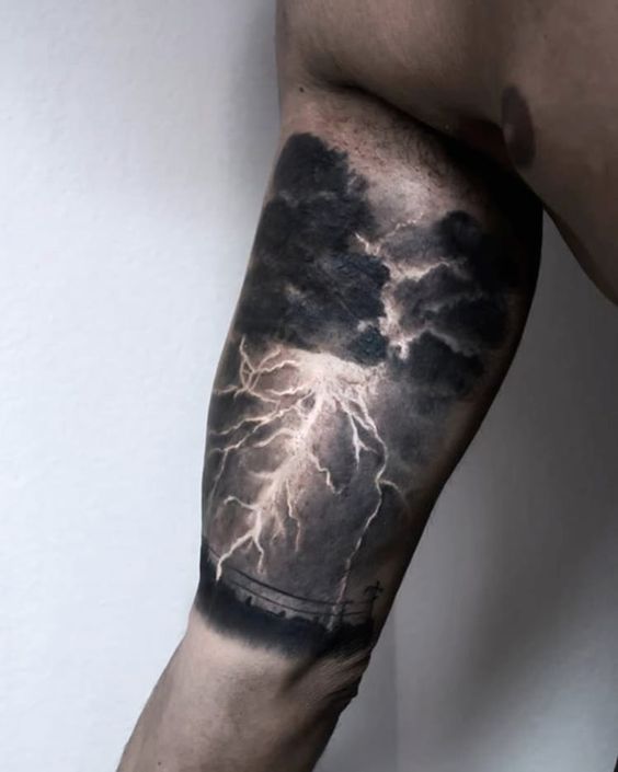 Intricate bicep lightning tattoo artwork representing the dynamic forces of nature and change.