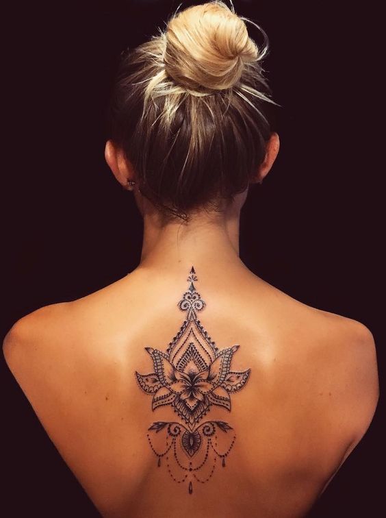 Lotus mandala tattoo on the back 