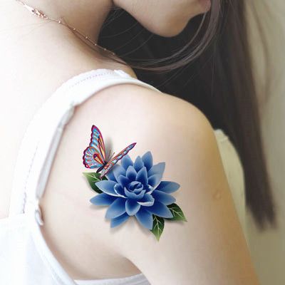 Shoulder blue realistic lotus tattoo