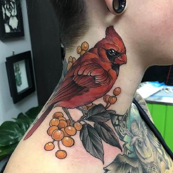 Cardinal tattoo on the neck