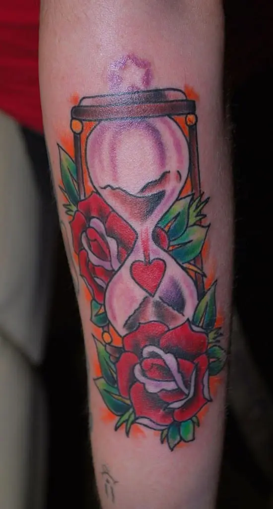Traditional forearm hourglass tattoo