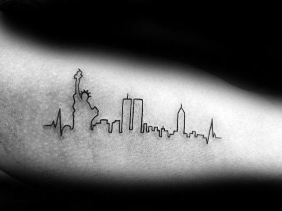 Forearm Heartbeat cityscape tattoo