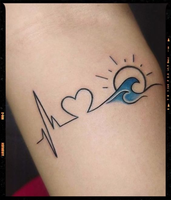 Heartbeat tattoo with ocean waves
