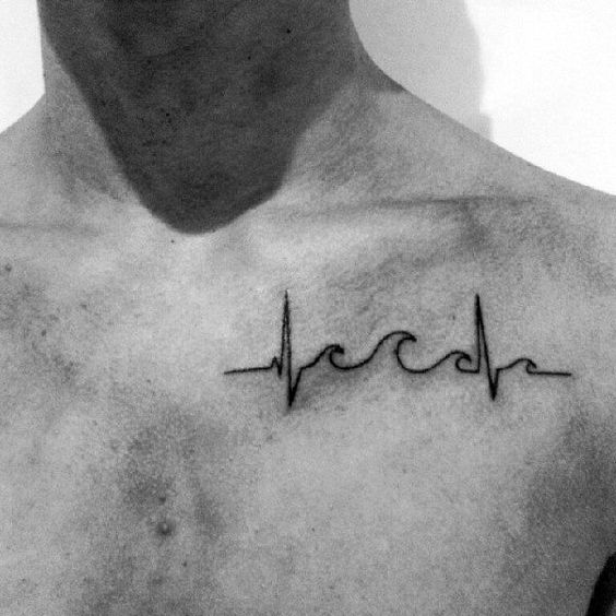 Chest Heartbeat tattoo with ocean waves