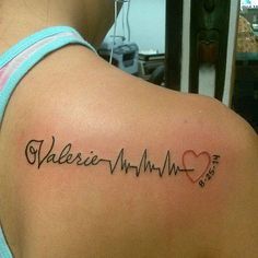 Shoulder tattoo with Baby's first heartbeat
