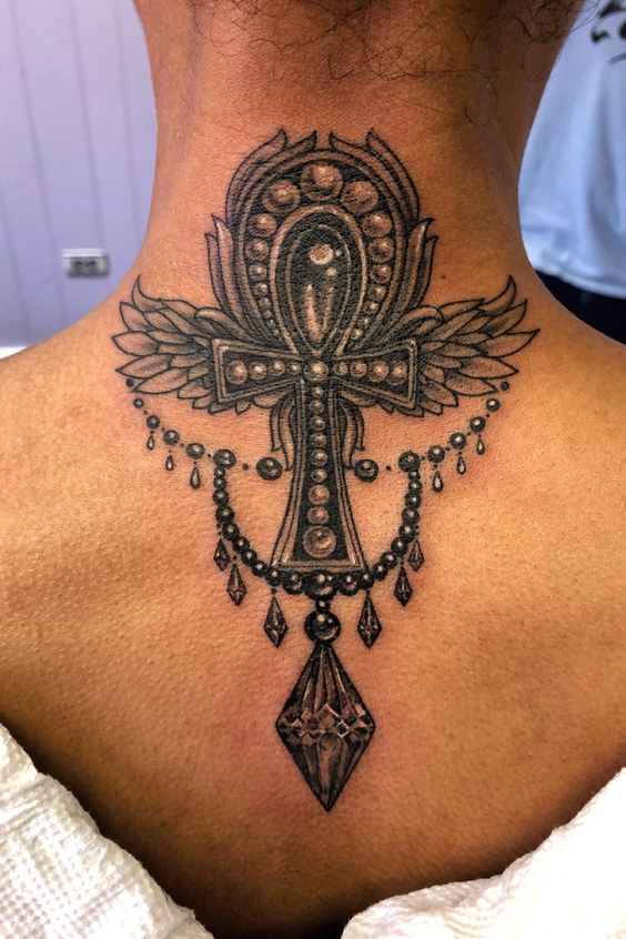 Back Ankh tattoo for women