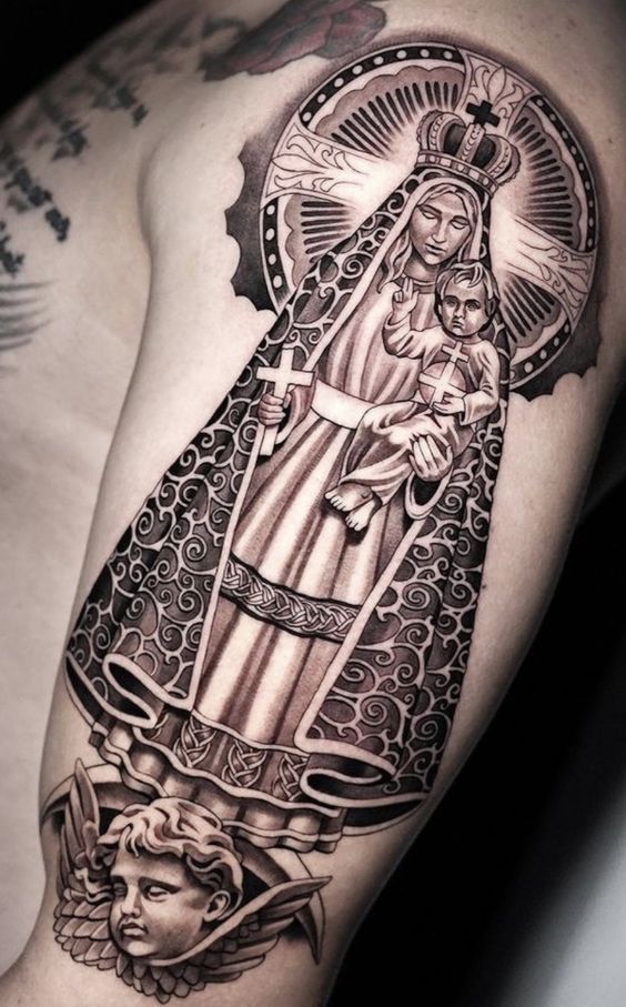 Shoulder Virgin Mary tattoo with a child in her arms