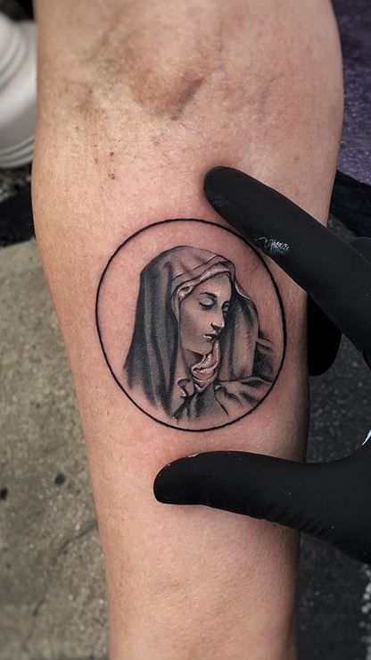 Forearm Virgin Mary tattoo