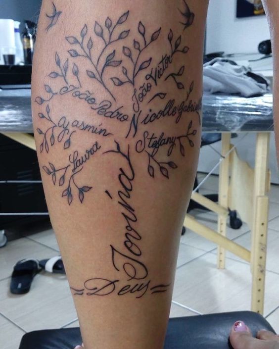 Family tree tattoo on the calf