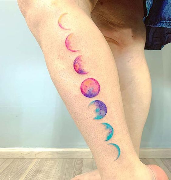 Moon phases calf tattoo