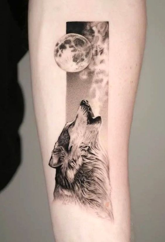 Forearm Wolf and Moon tattoo
