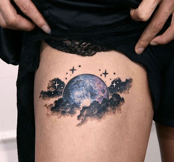 Moon Behind Clouds tattoo on the thigh