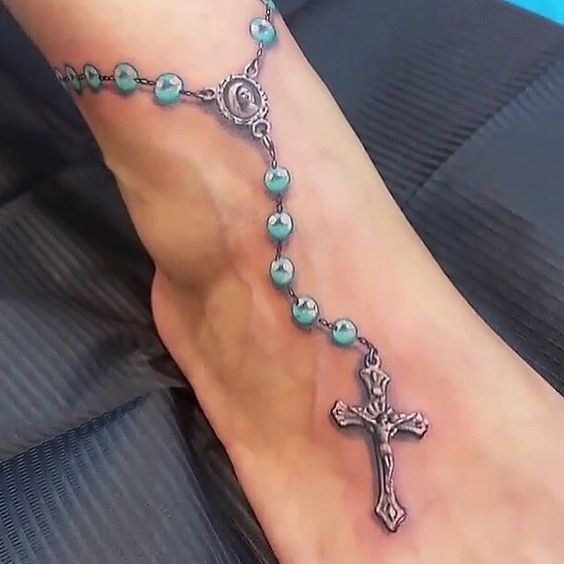 Ankle rosary tattoo