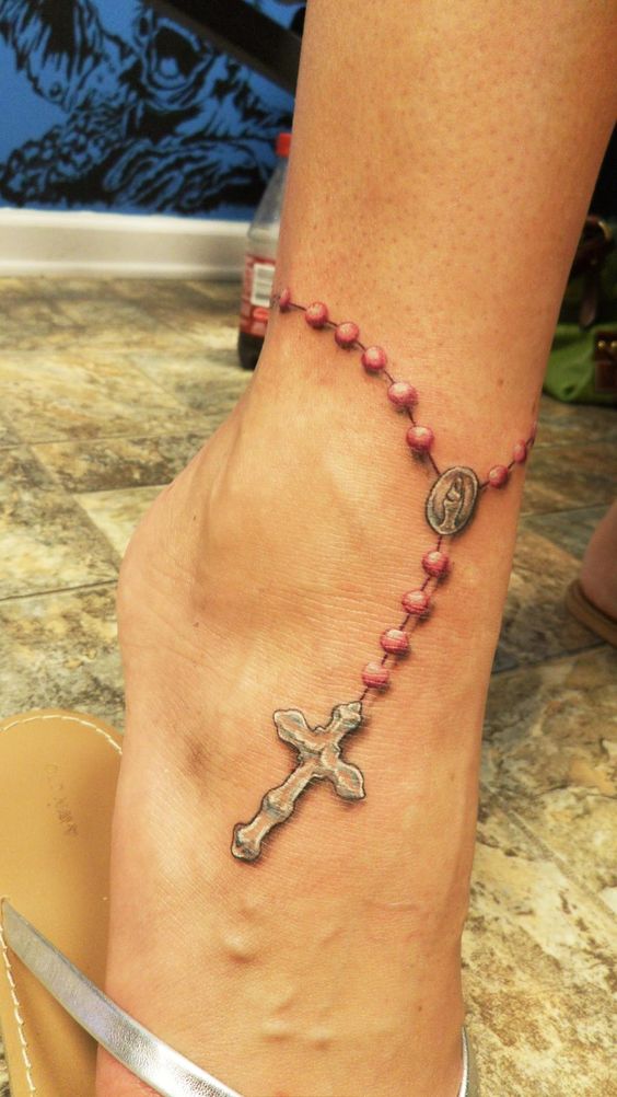Ankle rosary tattoo