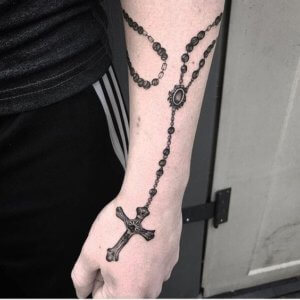 Meaning of rosary tattoo 6