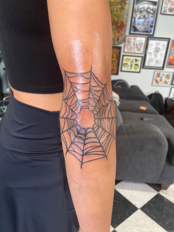 Meaning of spider web (net) tattoos