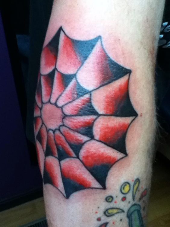 Elbow spider web tattoo