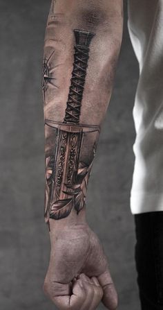 Forearm sword tattoo