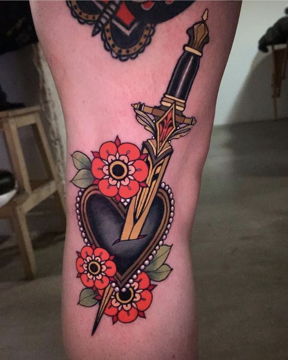 Leg hear dagger tattoo