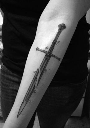Forearm broken sword tattoo