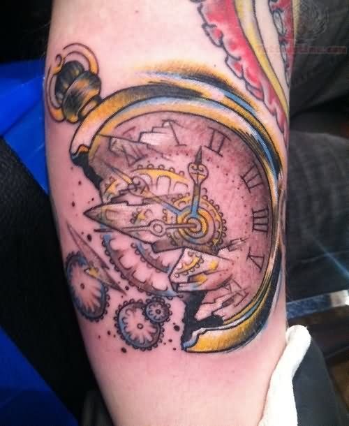 Old and broken clock tattoo on the calf