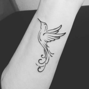 Photos of marvelous hummingbird outline tattoos we have seen this year 1