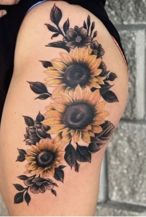 Thigh Sunflower tattoo