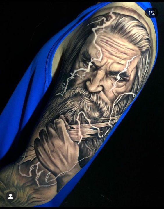 Shoulder Zeus tattoo with lightning