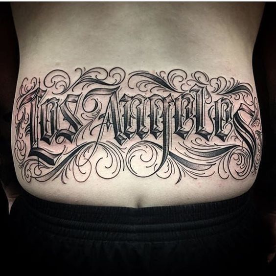 Back Chicano text tattoo