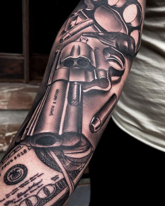 Forearm Chicano gun tattoo