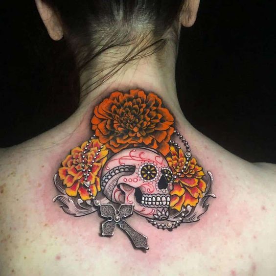 Back Marigold tattoo with skull