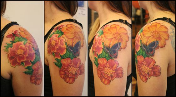 Realistic Marigold shoulder tattoo 