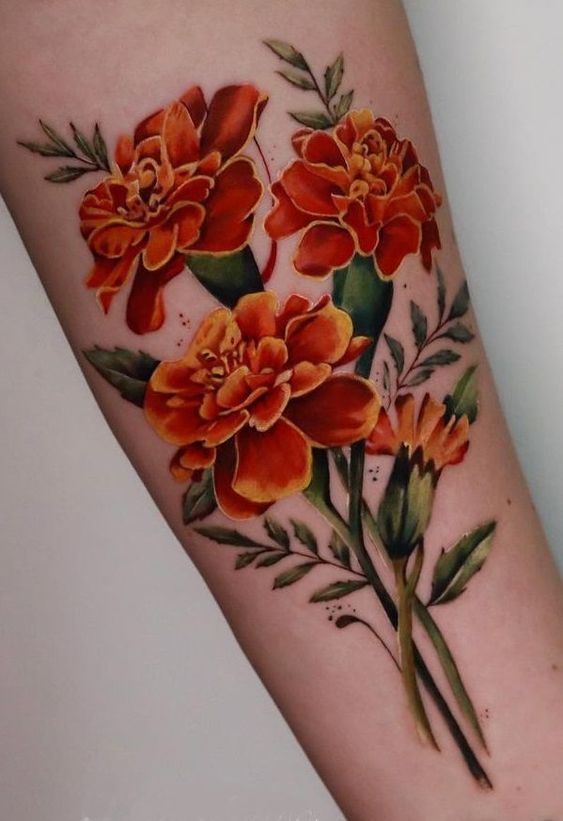 Forearm Marigold tattoo