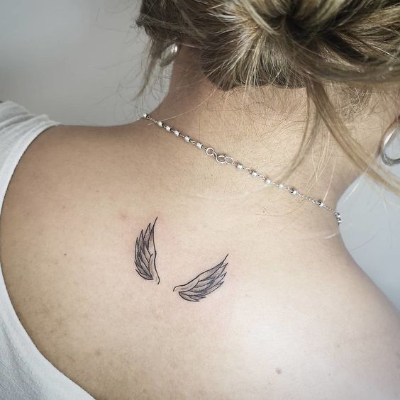 Angel wings tattoo on the back