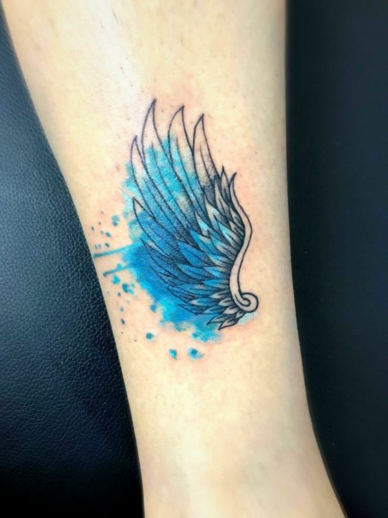 Watercolor angel wings tattoo
