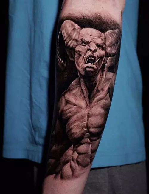 Forearm demon tattoo