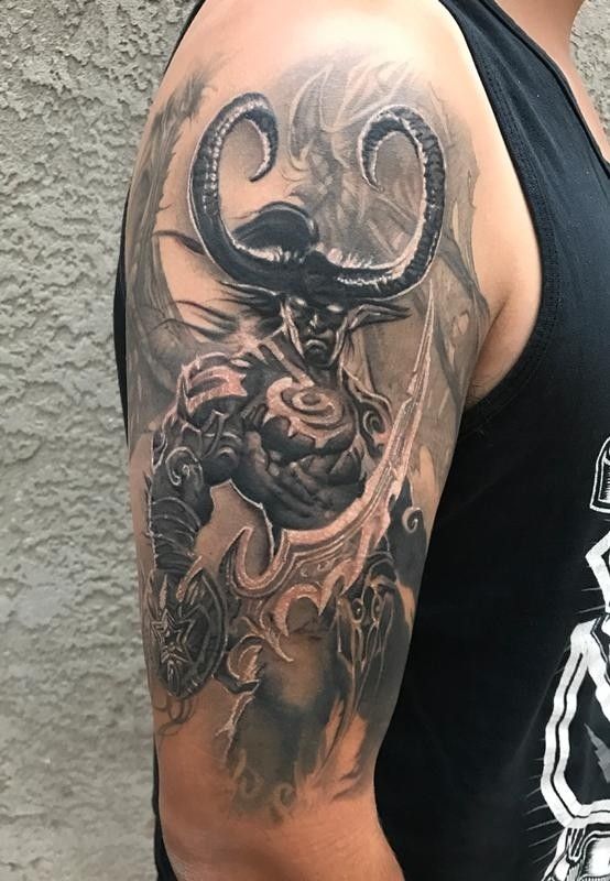Shoulder demon tattoo