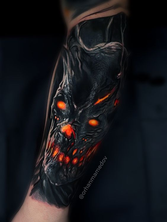 Forearm demon tattoo