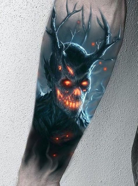 Forearm demon tattoo