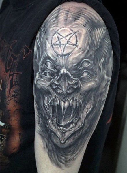 Shoulder demon tattoo