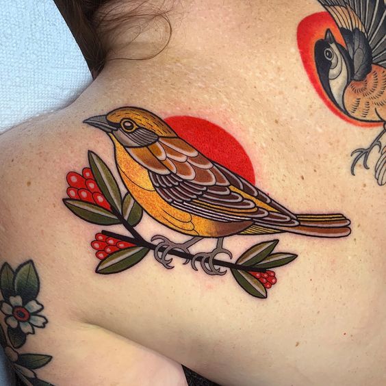 old-school sparrow shoulder tattoo
