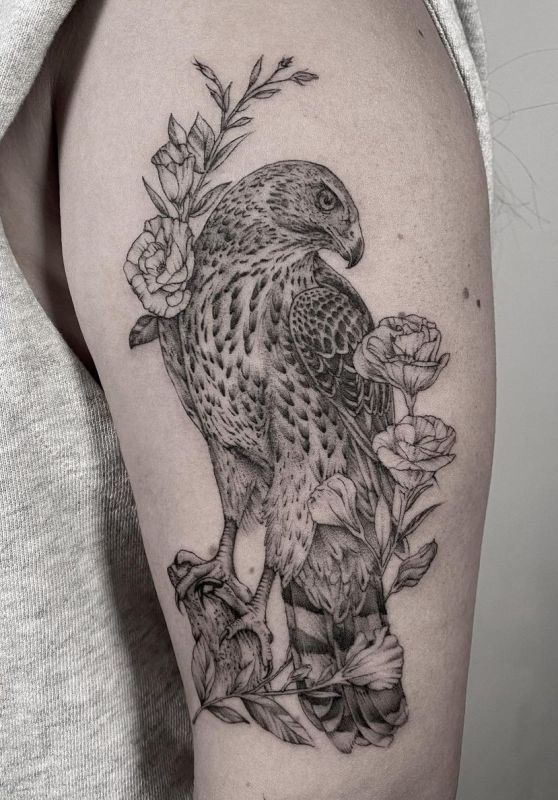 Black and white shoulder Hawk tattoo