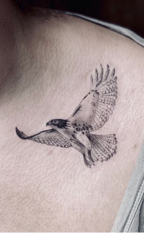 black and white Hawk tattoo