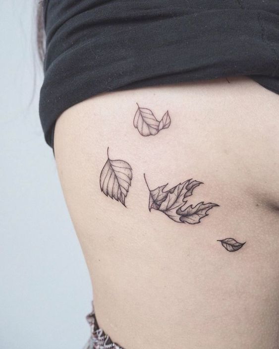 Leaf tattoo on the ribs